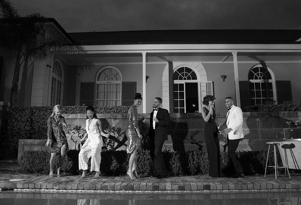 People dancing poolside