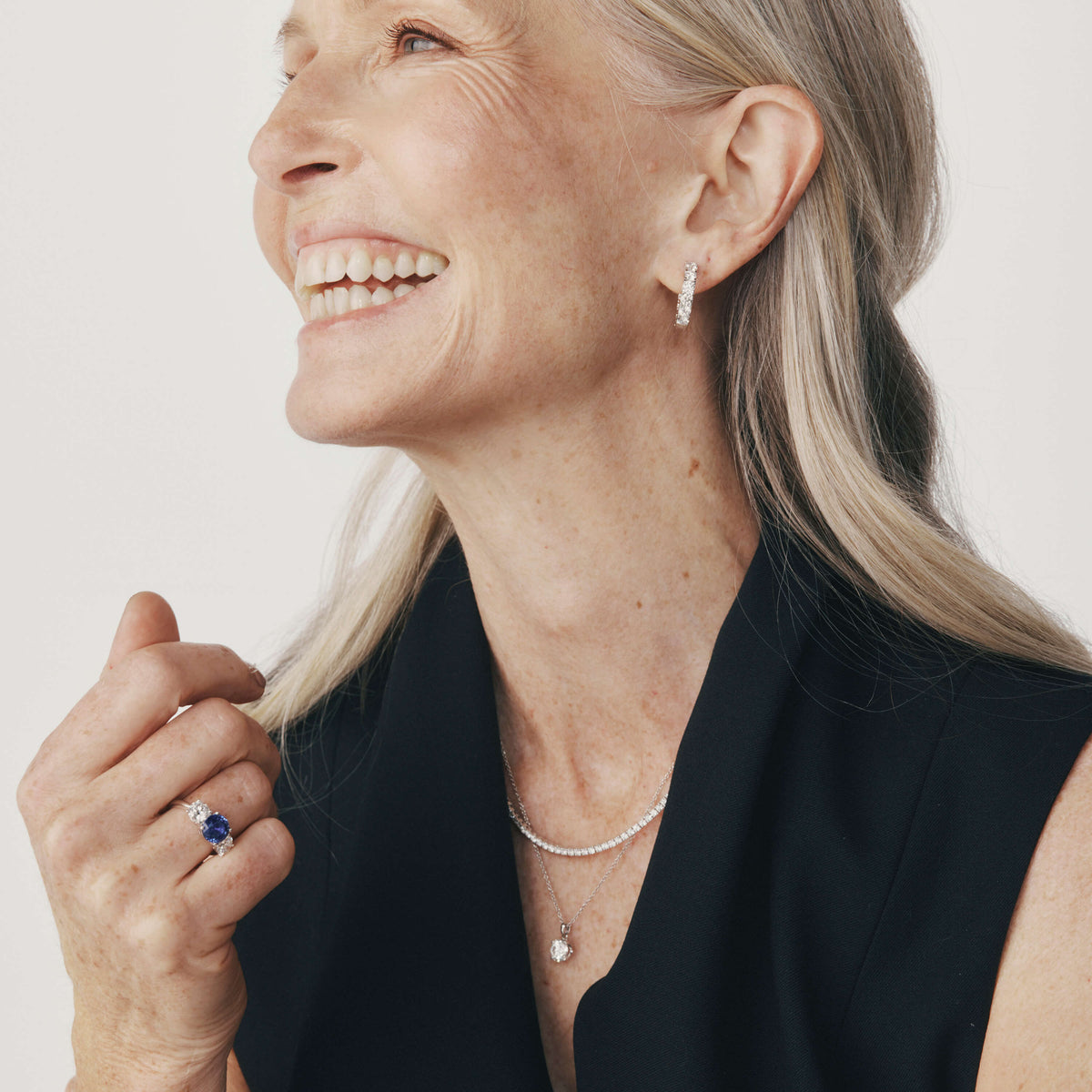 Model wearing natural diamond and gemstone jewellery from the 1899 Collection