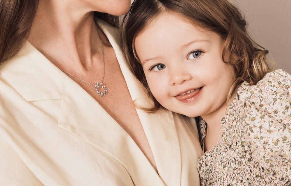 Mother wearing Laurel Pendant