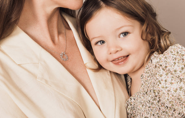 Mother wearing Laurel Pendant