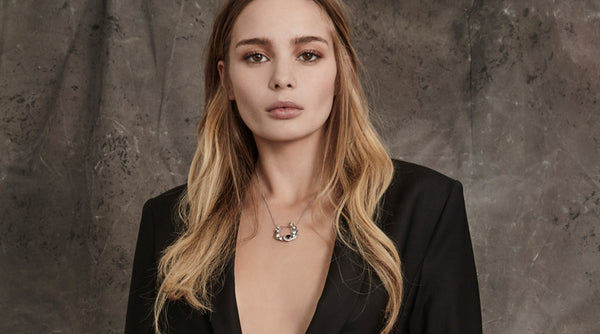 Model wearing vintage necklace