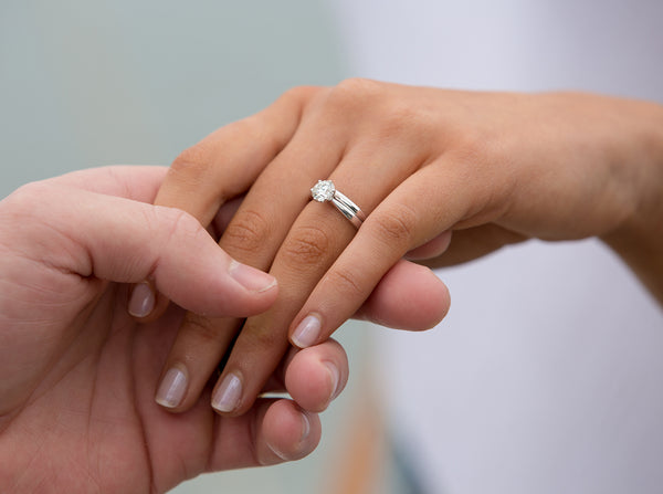 Model wearing Diamond Nova Ring and band