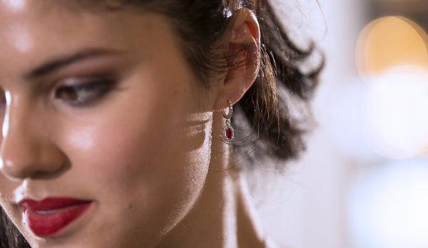 Model wearing ruby earrings