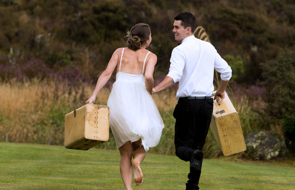 Newly married couple going on honeymoon