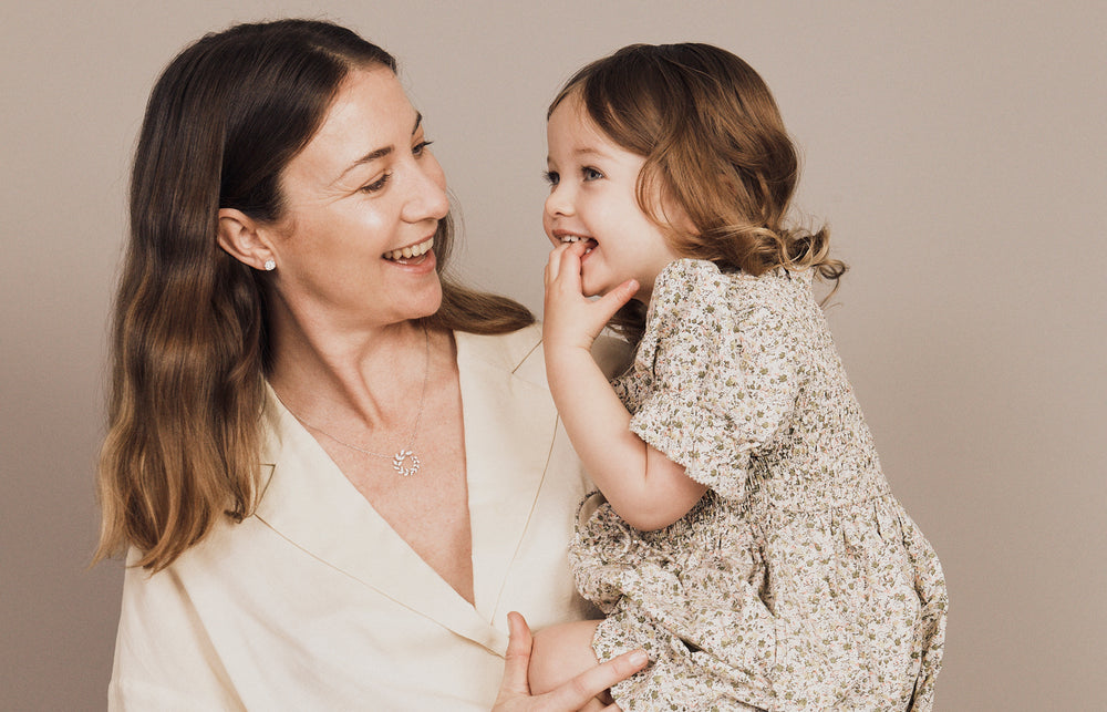 Mother and Daughter embracing