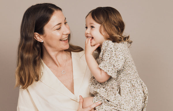 Mother and Daughter embracing