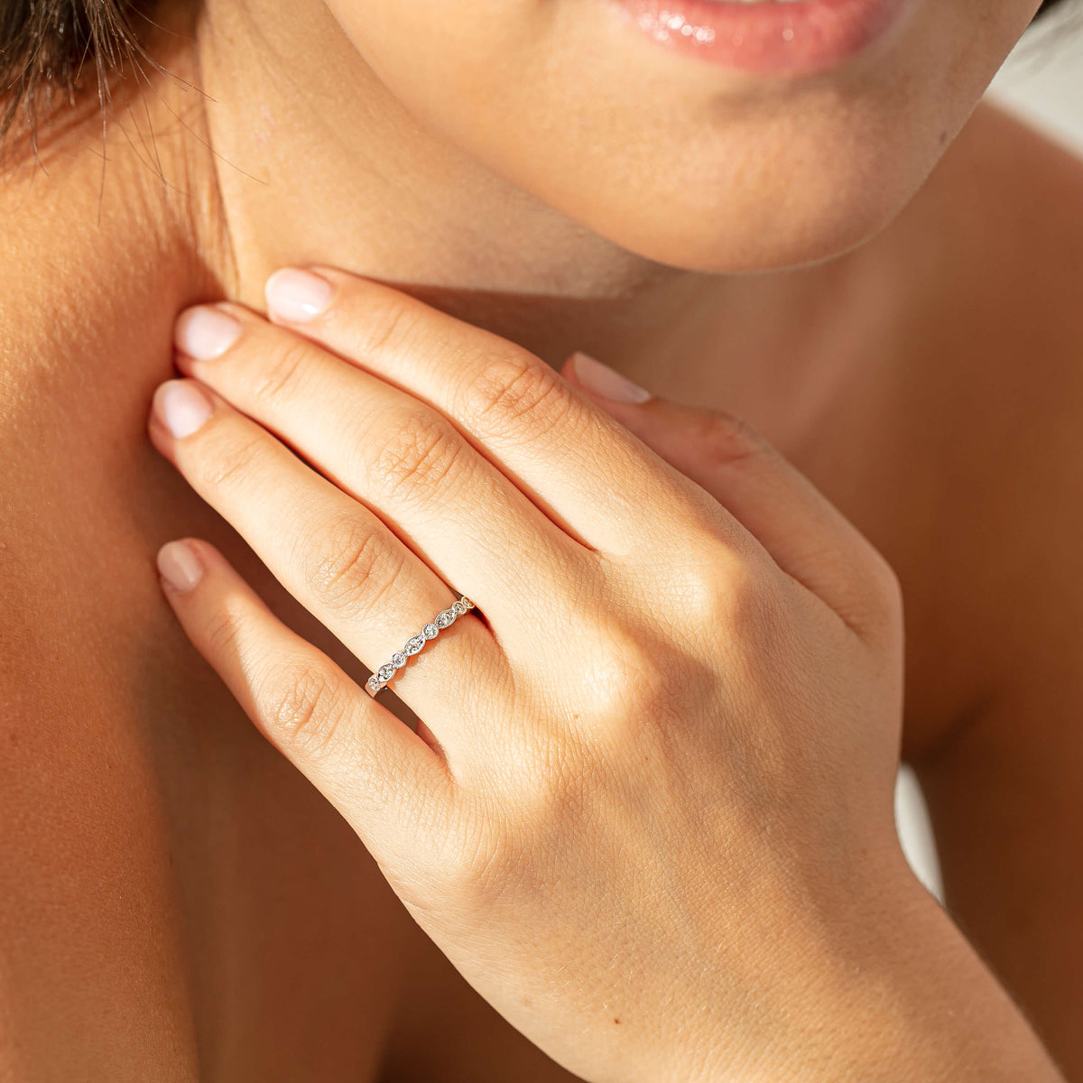 Model wearing white gold diamond Aura Ring