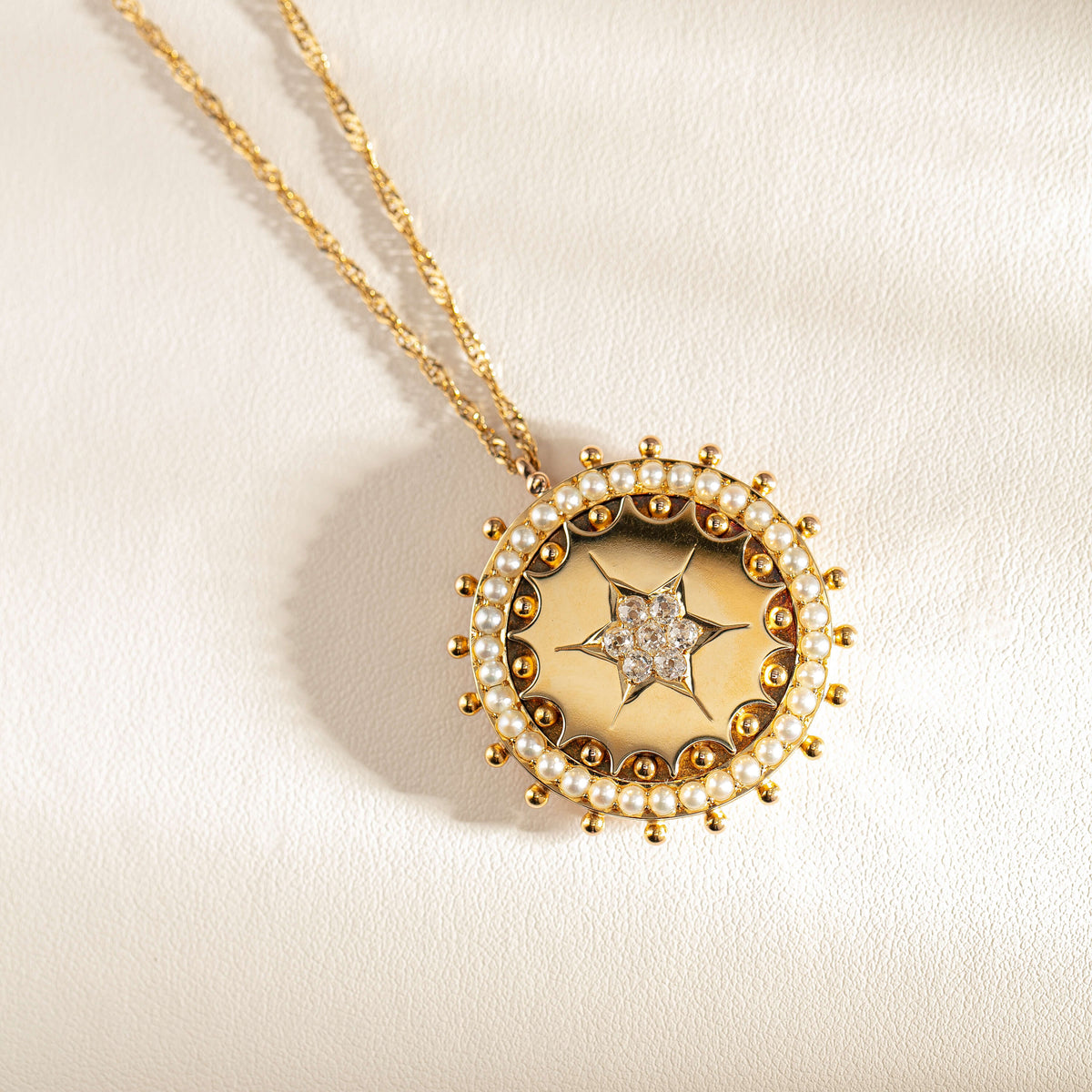 Evolved pearl and diamond pendant