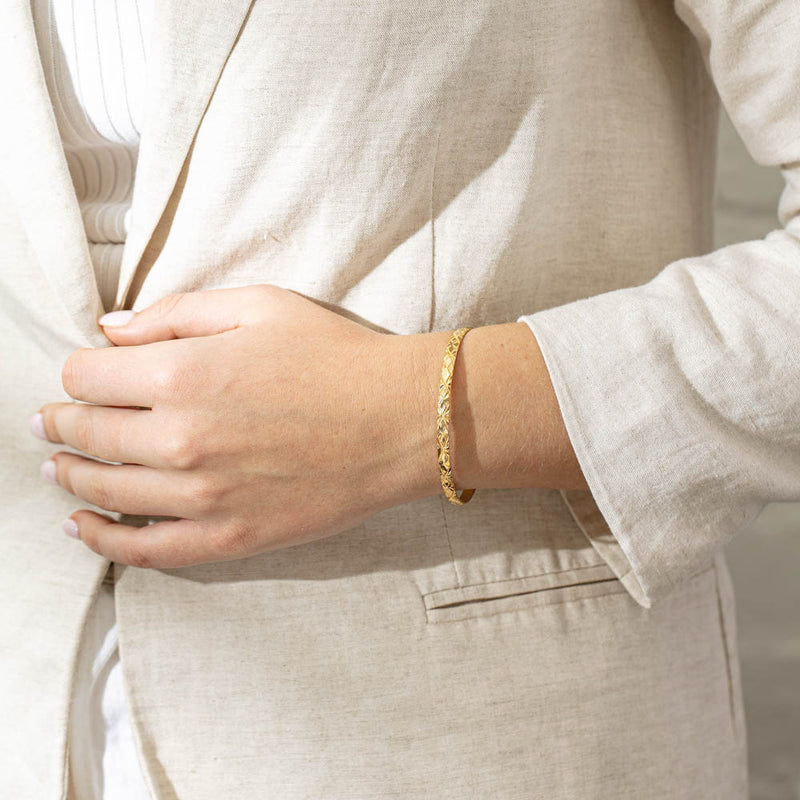 Deja Vu 22ct Yellow Gold Patterned Bangle-Bracelet-Walker & Hall