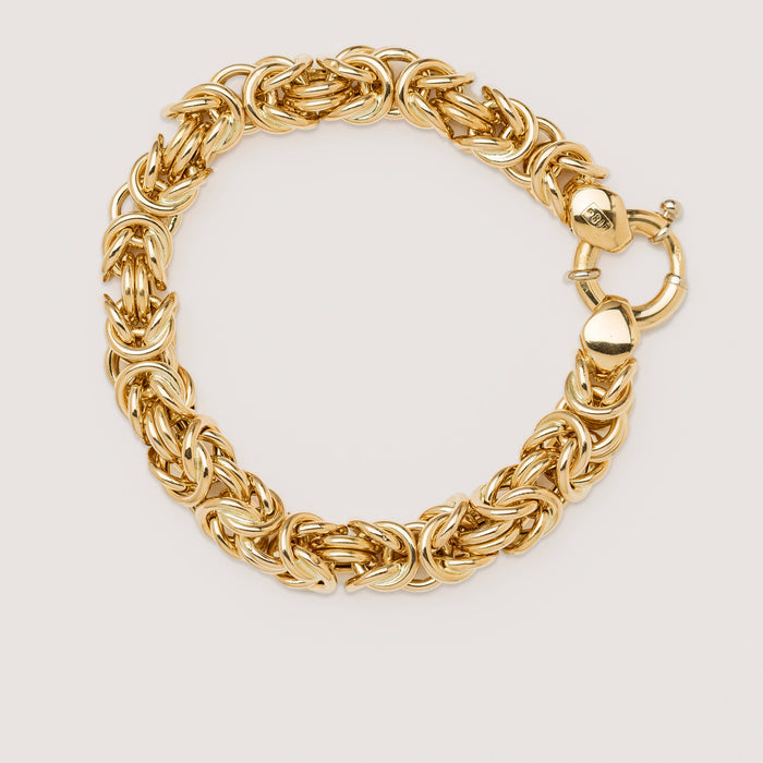 Yellow gold Byzantine link bracelet on neutral background