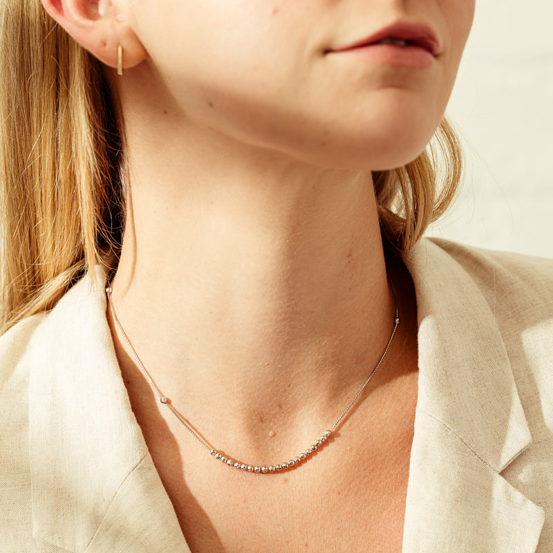 Deja Vu Platinum Floating Bead Necklace-Necklace-Walker & Hall