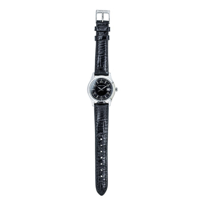 Watch with black strap and silver case on a white background