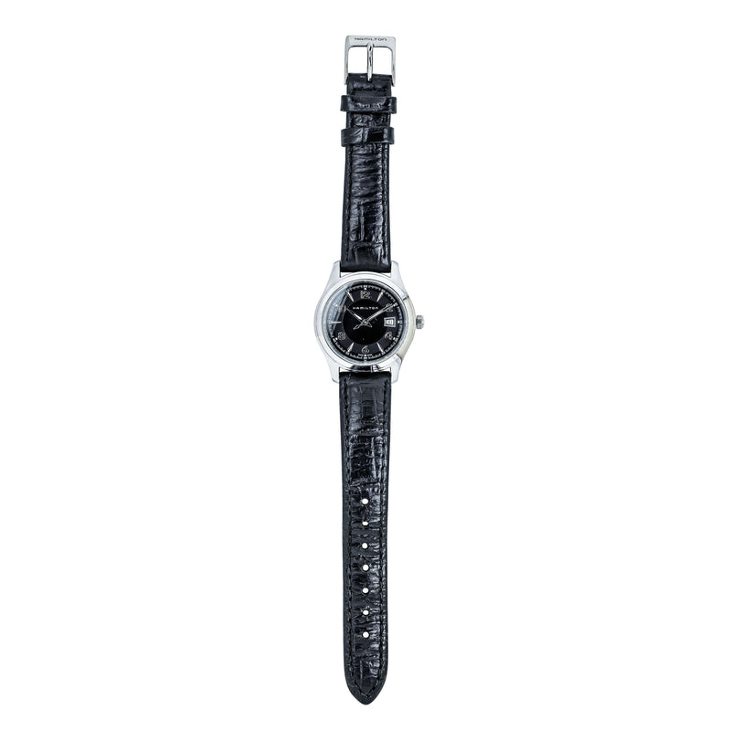 Watch with black strap and silver case on a white background