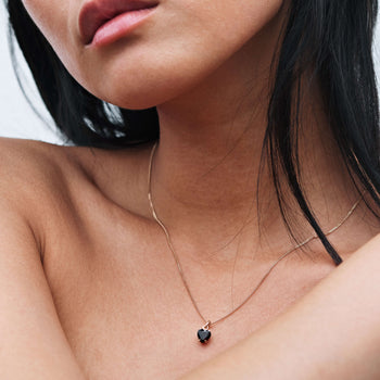 Model wearing Meadowlark Heart Pendant