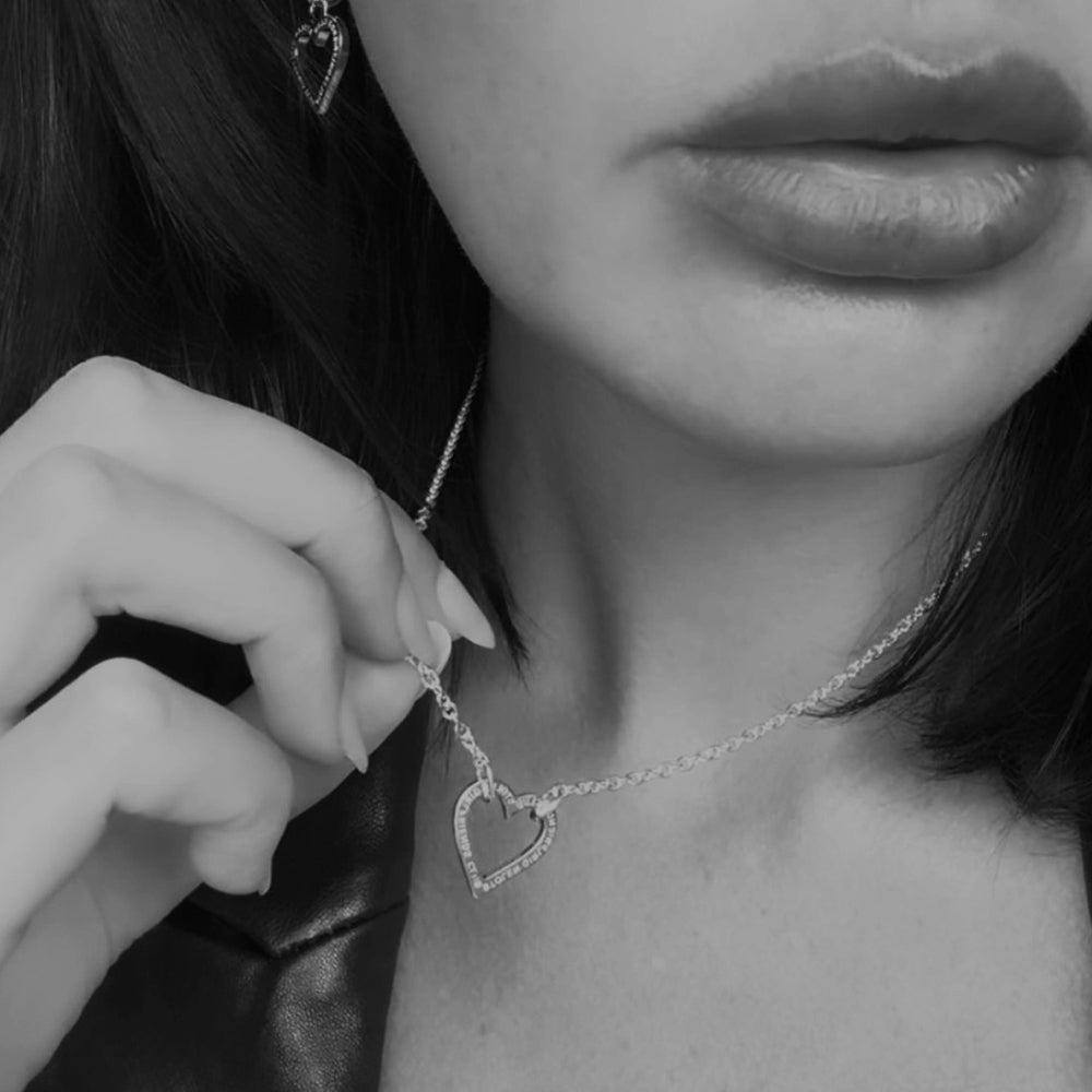Model wearing Stolen Girlfriends Club Halo Heart Pendant