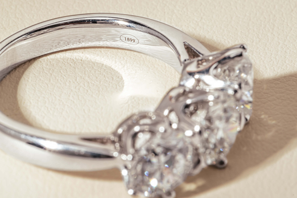 Diamond Trilogy Ring with 1899 hallmark stamp