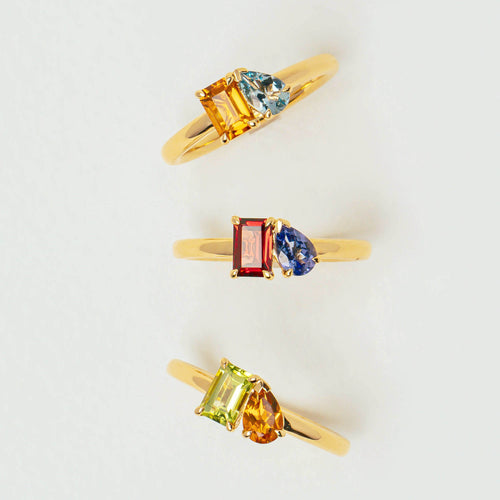 Coloured gemstone Moi et Toi Rings on neutral background