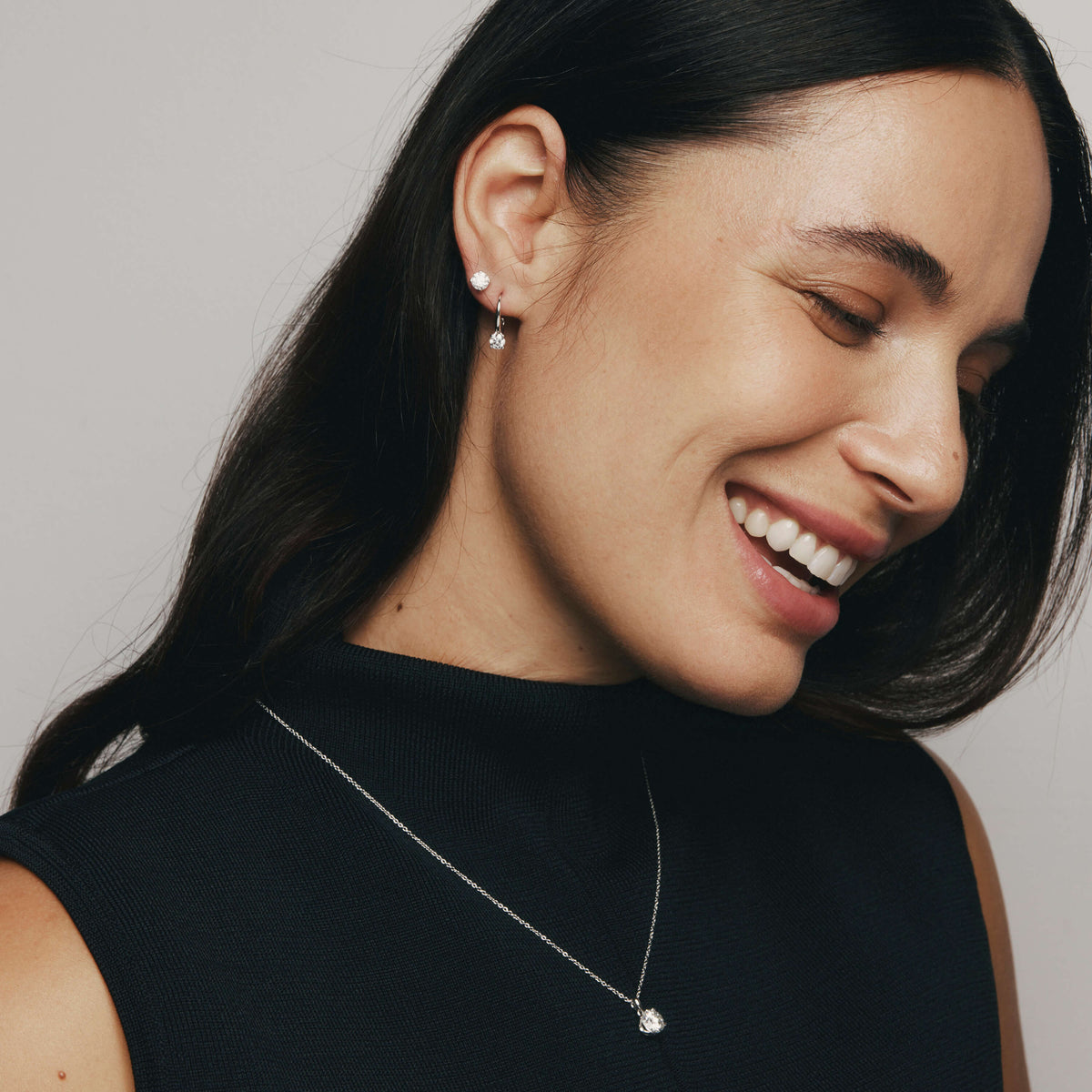 Model wearing Natural Diamond Blossom Pendant, Drop Earrings and Studs