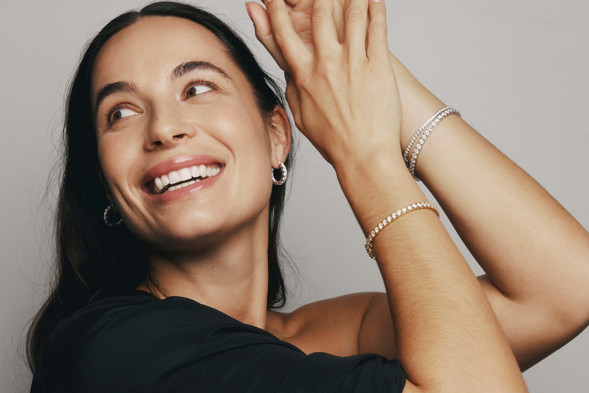 Model wearing Natural Diamond Jubilee Earrings and Bracelets