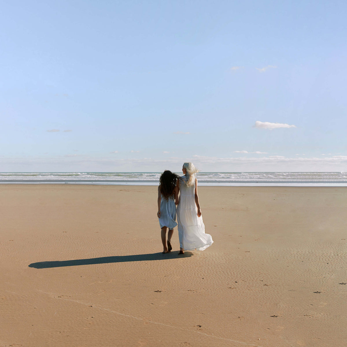 Mother and daughter on NZ beach