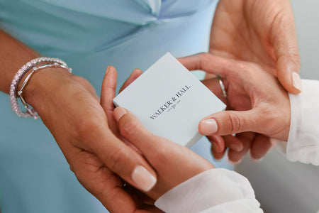 Mother gifting her daughter a Walker & Hall jewellery box