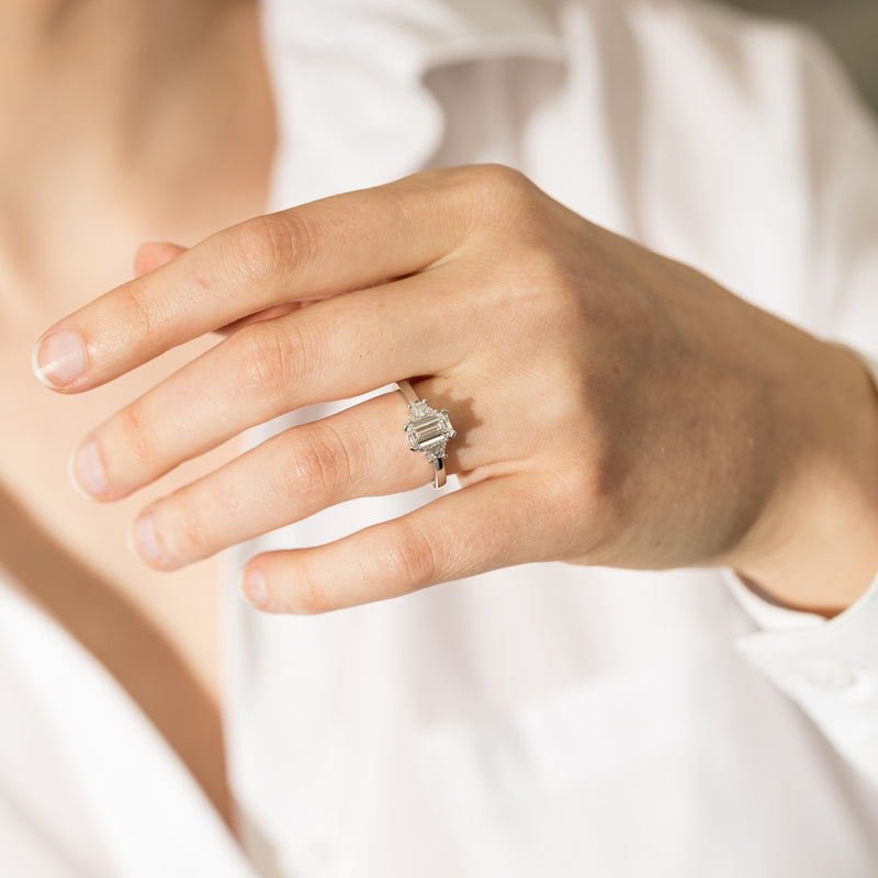 18ct White Gold Emerald Cut Diamond Odyssey Ring-Ring-Walker & Hall